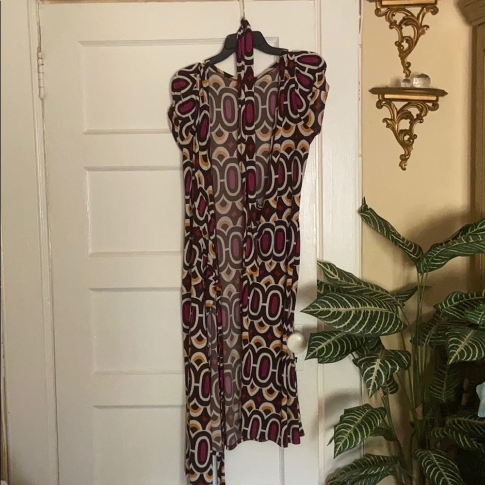 patterned dress that ties around your waist.